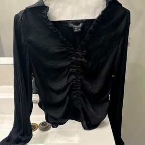 Black silk material blouse